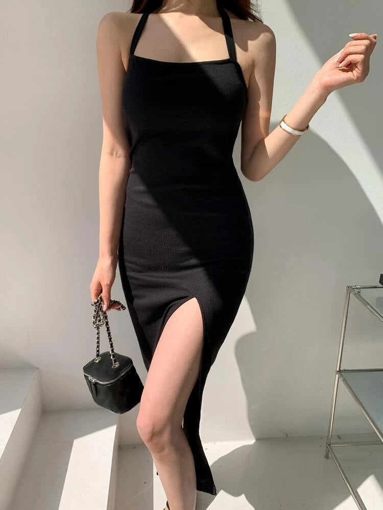 Sultry Silhouette: The Black Halter Neck Bodycon Midi Dress