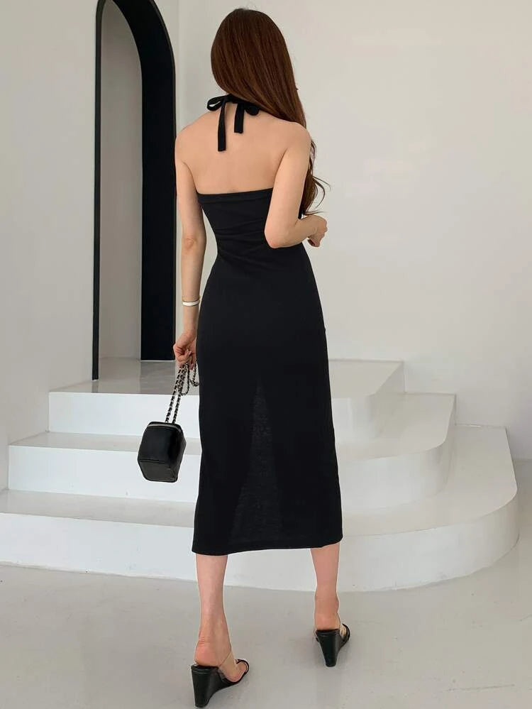Sultry Silhouette: The Black Halter Neck Bodycon Midi Dress